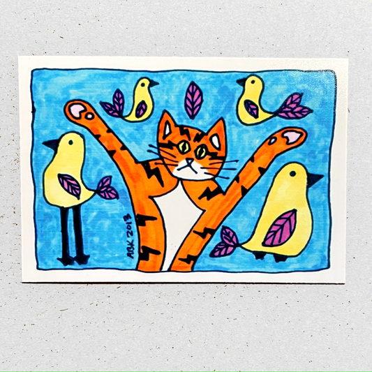 Magnet featuring a whimsical drawing of Superpussy-an orange cat with his paws in the air- surrounded by yellow birds iwth purple wings.