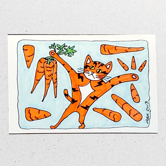 A magnet with a drawing of an orange cat with black stripes like lightning bolts and his paws in the air. He holds a bunch of carrots and there are carrots around him.